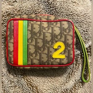 VINTAGE CHRISTIAN DIOR rasta trotter pochette wristlet!